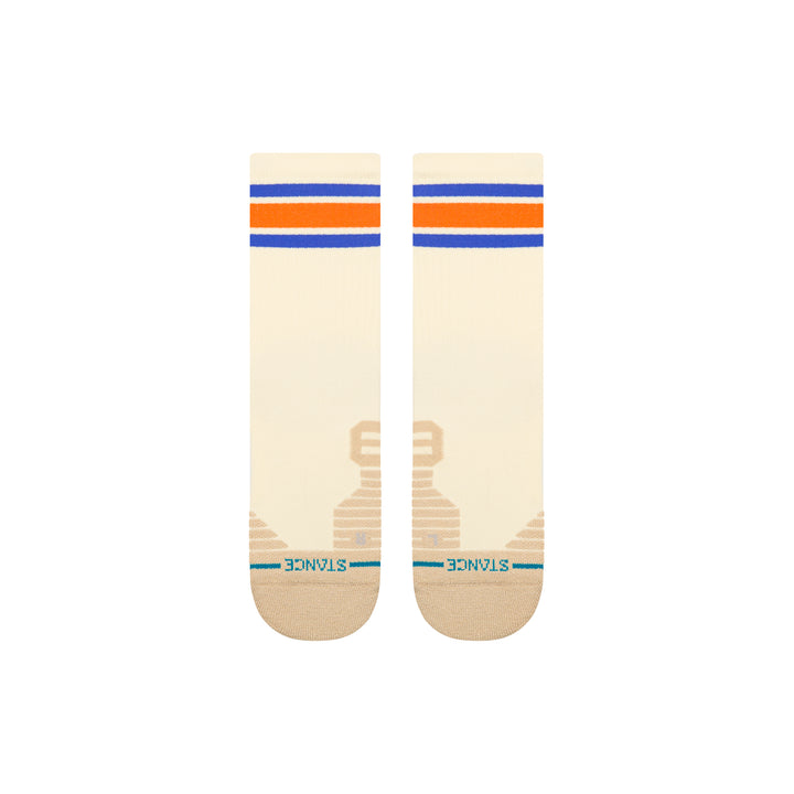 A pair of beige-coloured crew socks laid flat, with orange and blue stripes at the top and an embroidered blue STANCE logo across the toes.