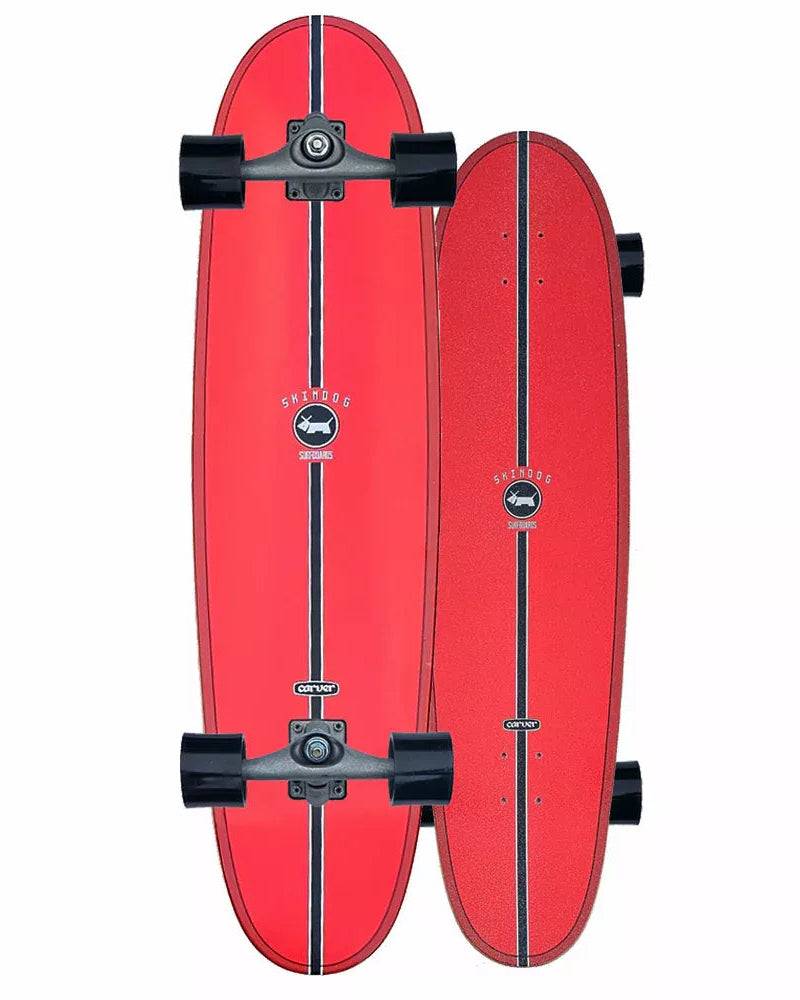 Red skateboard with black trucks and bearings on a white background