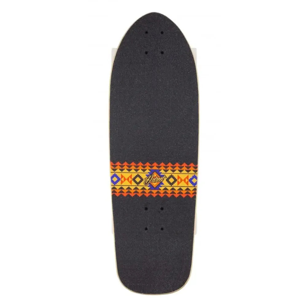 Black skateboard deck with a colorful pattern and brand logo on a white background