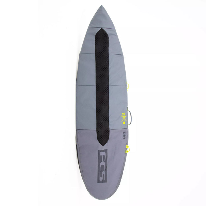 Grey surfboard bag with black center padding and FCS logo on a white background