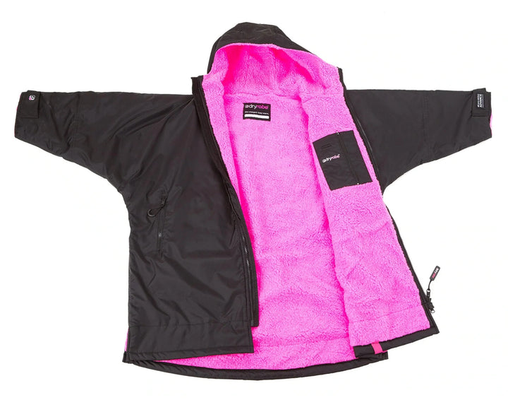 Black and pink Dryrobe with visible brand logo on a white background
