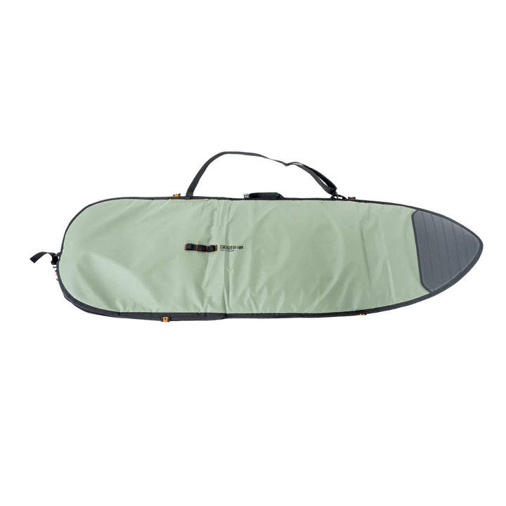 Green and black FCS surfboard bag on a white background