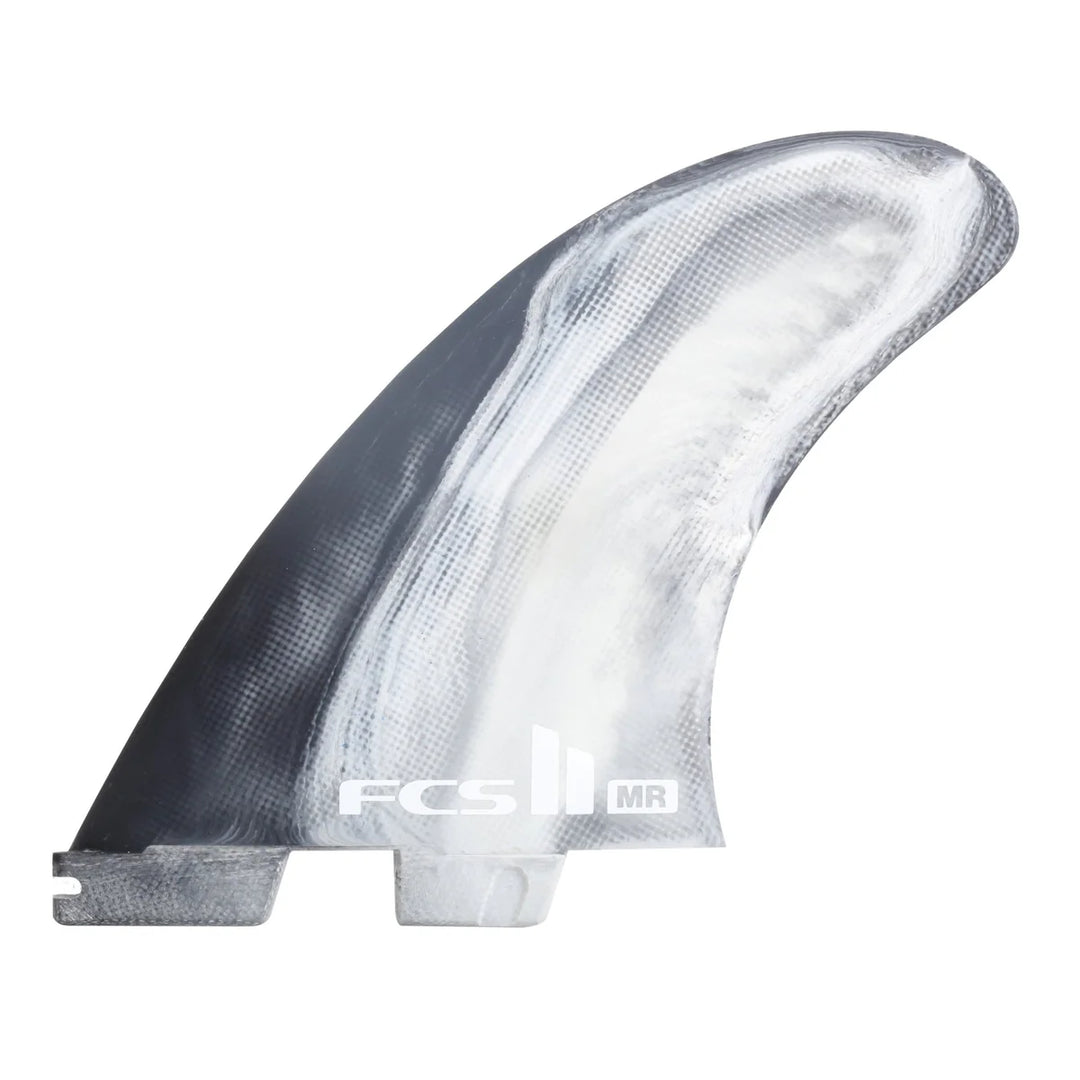 Surfboard fin with 'FCS' branding on a white background