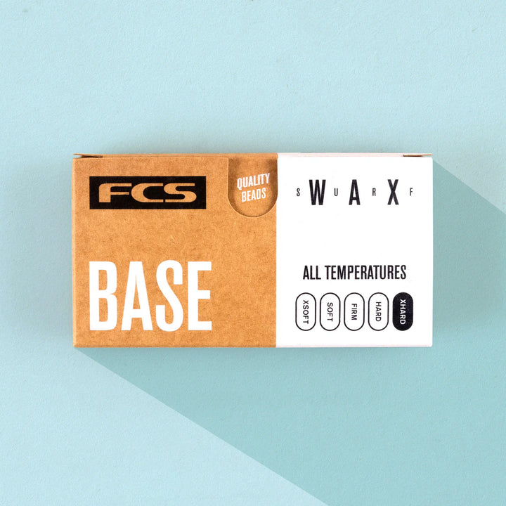 FCS wax box on a light blue background