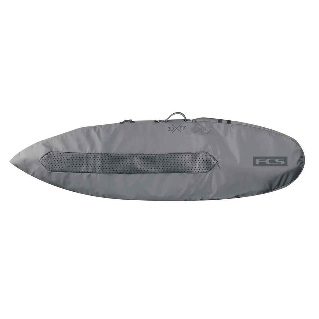 Grey surfboard bag with FCS logo on a white background