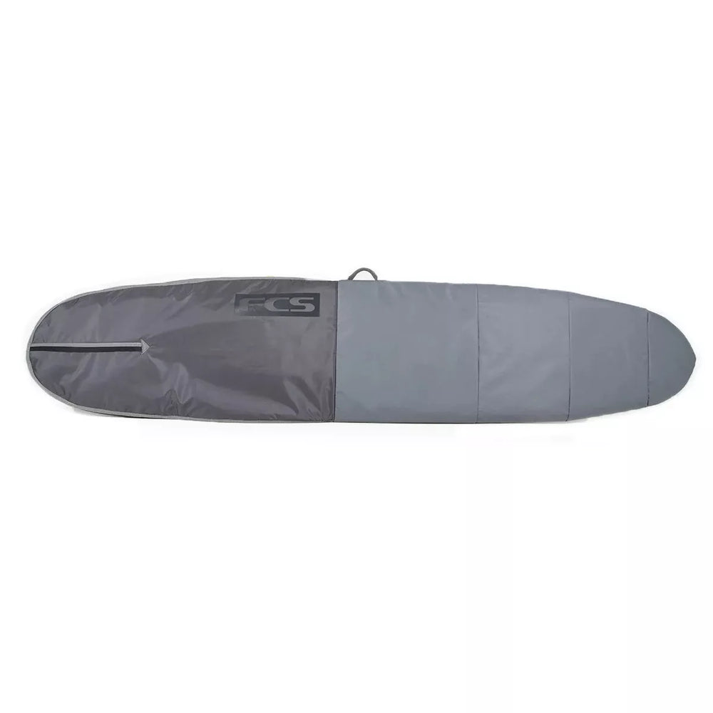 Grey surfboard bag with a FCS logo on a white background
