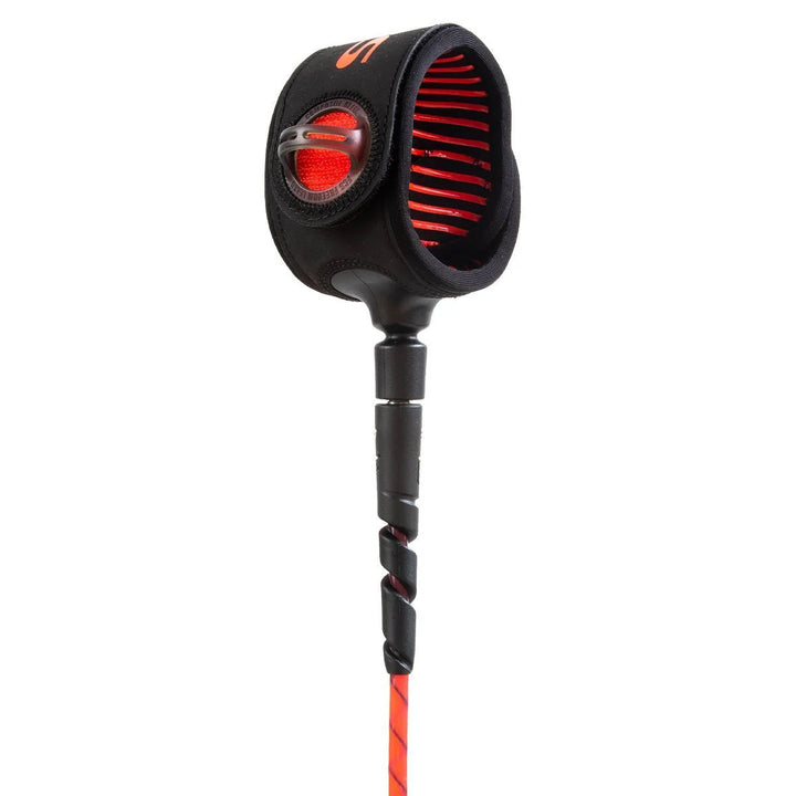 Black and red ankle strap of a surfboard leash on a white background