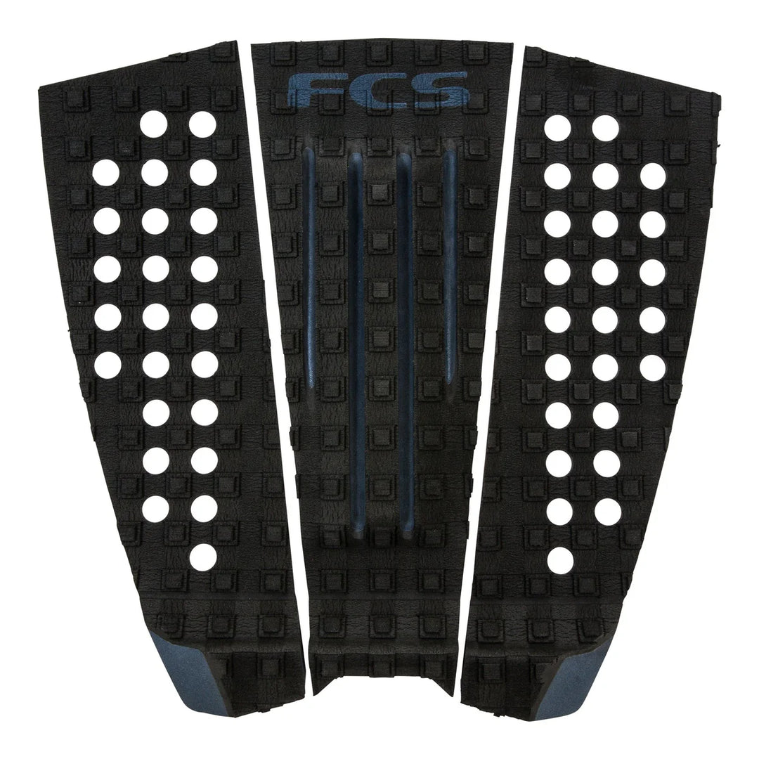 Three-piece, black and grey FCS branded surfboard tail pad on a white background