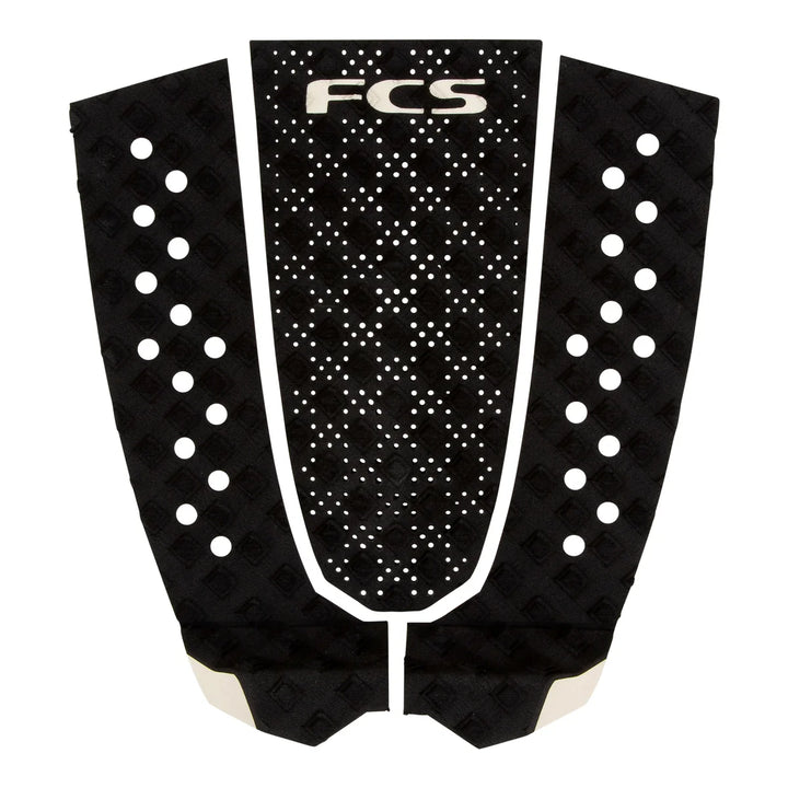 Black FCS surfboard tail pad on a white background.