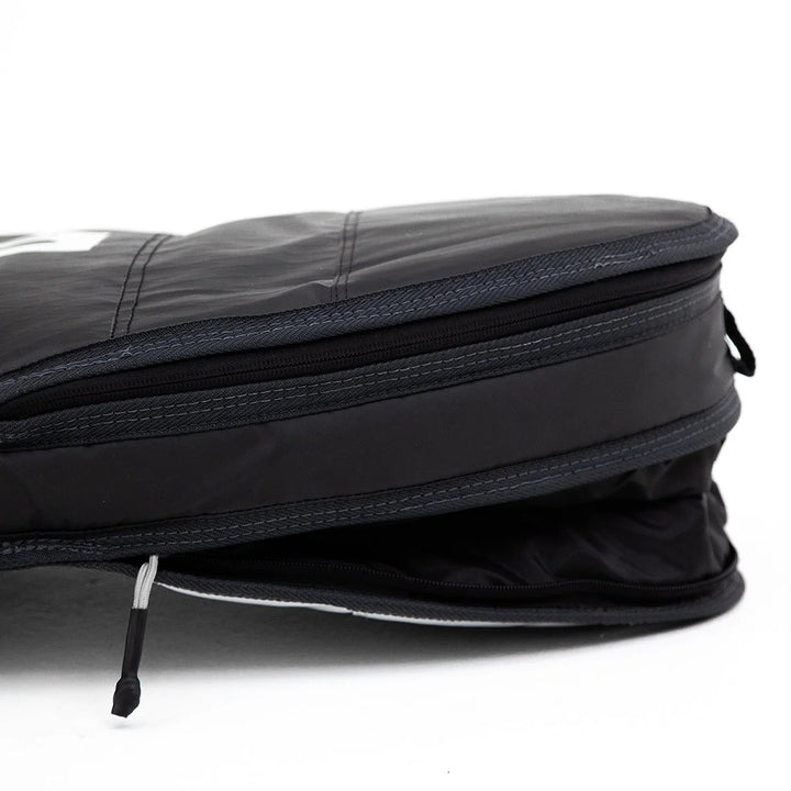 Black FCS board bag with a visible brand logo on a white background