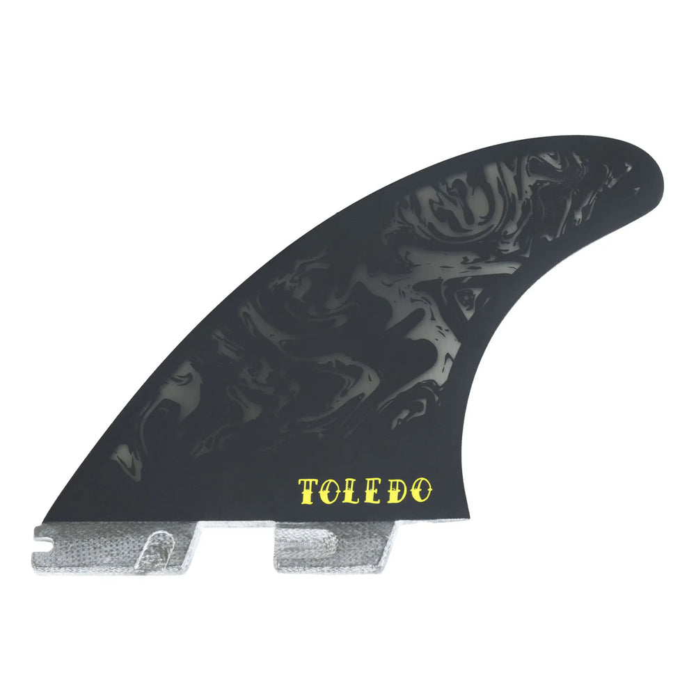 Black surf fin with 'Toledo' branding on a white background