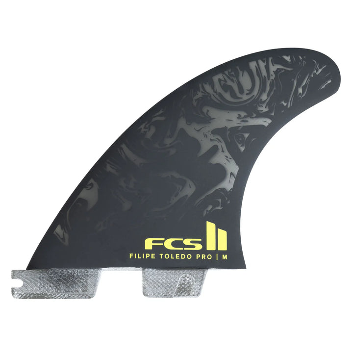 Surfboard fin with FCS II branding on a white background
