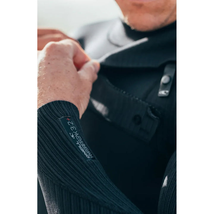 Close-up of a person wearing a dark O&