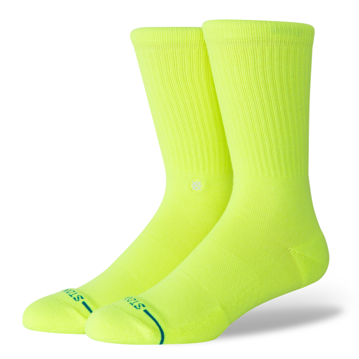 A pair of fluorescent yellow socks on a transparent background