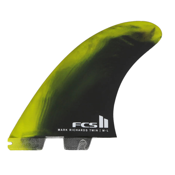 Green and black surfboard fin with FCS logo on a white background
