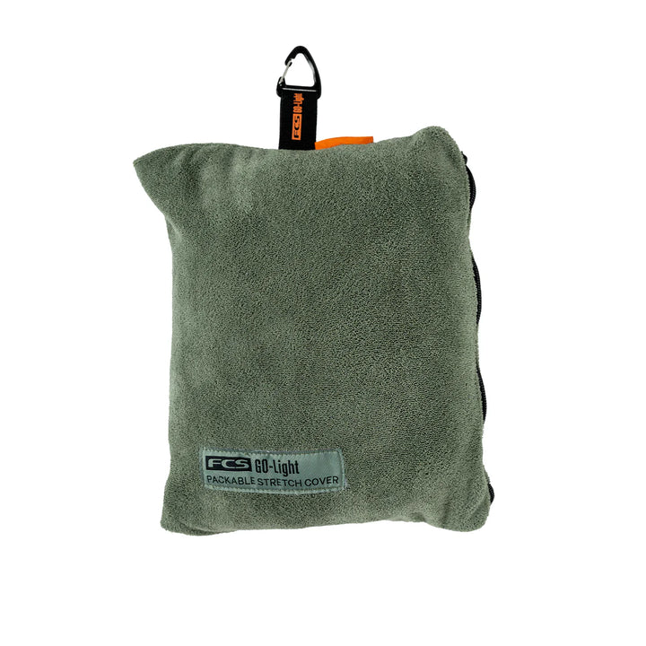 Green packable stretch cover with a carabiner on a white background