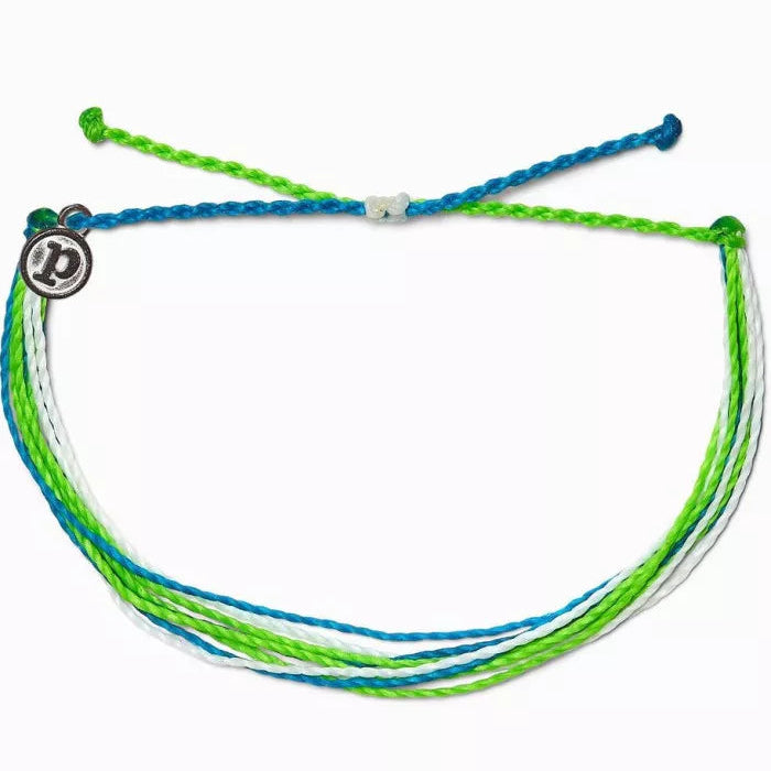 Multistrand bracelet with green, blue, and white cords on a white background
