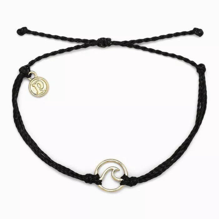 Black braided bracelet with gold wave charm on a white background