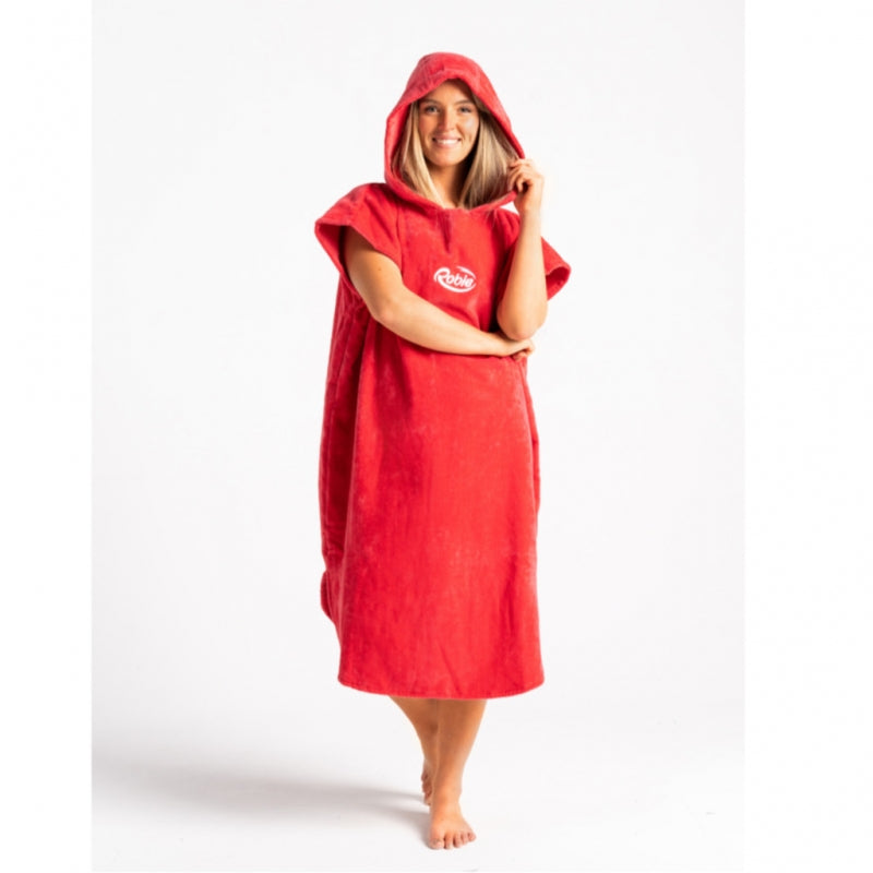 Person wearing a red hooded towel with a logo on a white background