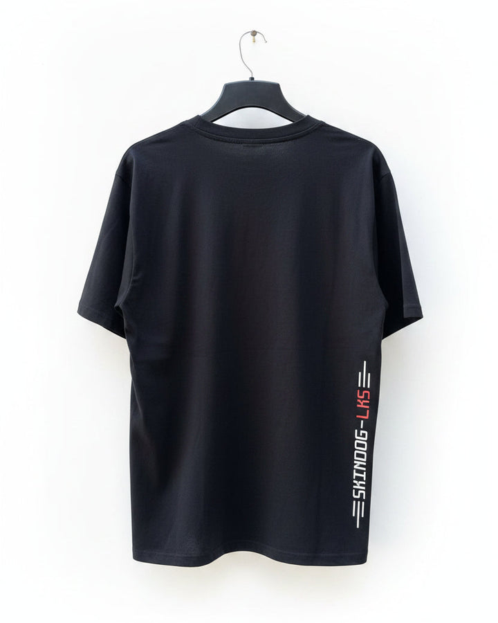 A black short-sleeve t-shirt hanging on a black hanger against a white background. The shirt features a vertical graphic on the lower left side with the text &