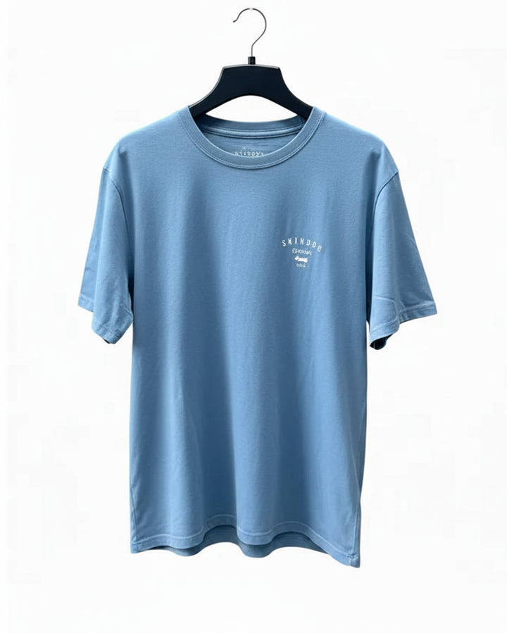 Blue t-shirt on a hanger against a white background