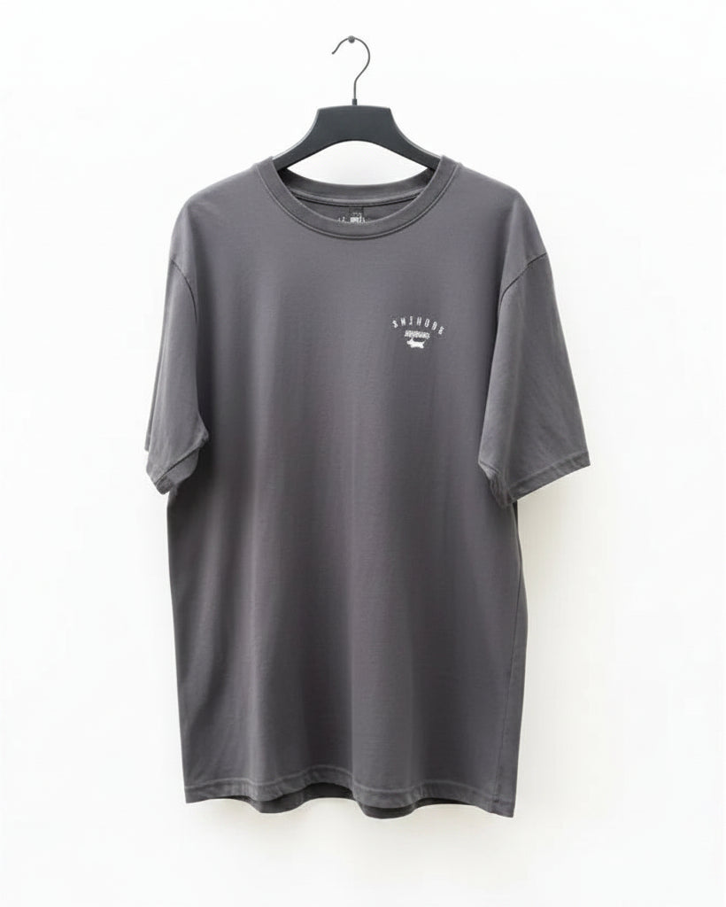 Washed black t-shirt with a logo on a white background