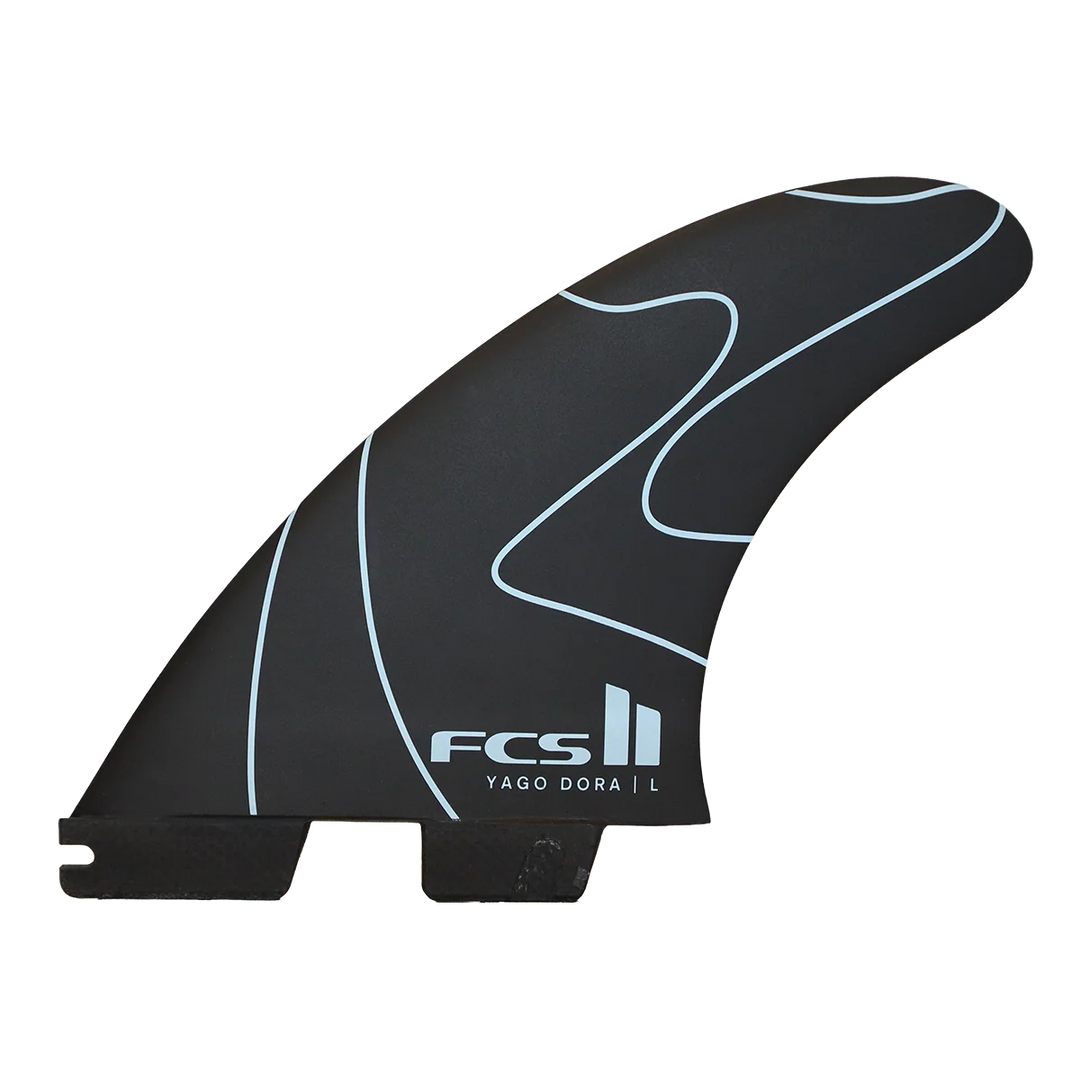 Black FCS II surfboard fin with "Yago Dora" and green accent stripes, on a white background.