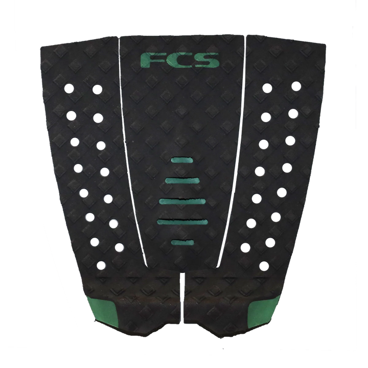 Black and green FCS surfboard tail pad on a white background