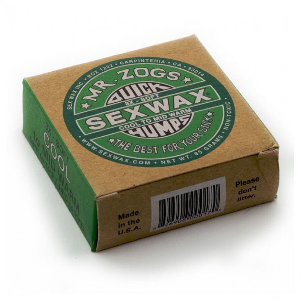 Box of surf wax branded "Mr. Zogs SEXWAX" with a green emblem on a white  background